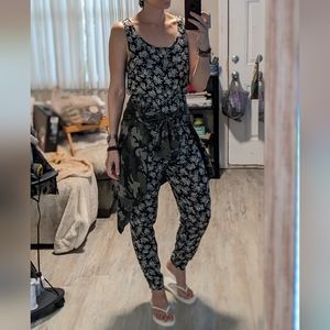 Sleeveless floral jumpsuit with open back size medium